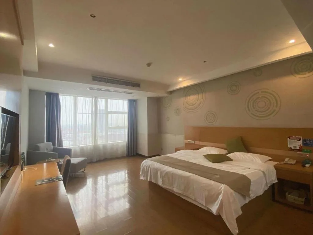 Bed in GreenTree Inn Ningbo Hangzhou Wan New District Lishi Square Business Hotel