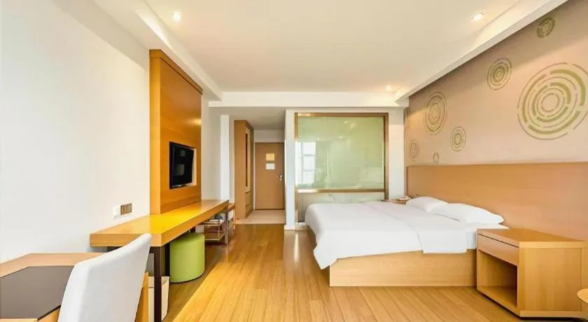 Bed in GreenTree Inn Ningbo Hangzhou Wan New District Lishi Square Business Hotel
