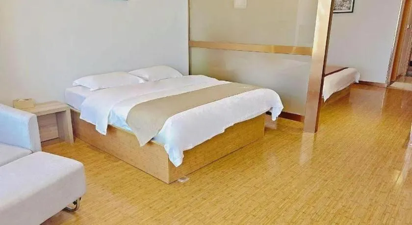 Bed in GreenTree Inn Ningbo Hangzhou Wan New District Lishi Square Business Hotel
