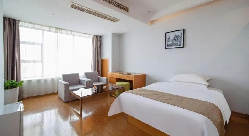 Bed in GreenTree Inn Ningbo Hangzhou Wan New District Lishi Square Business Hotel