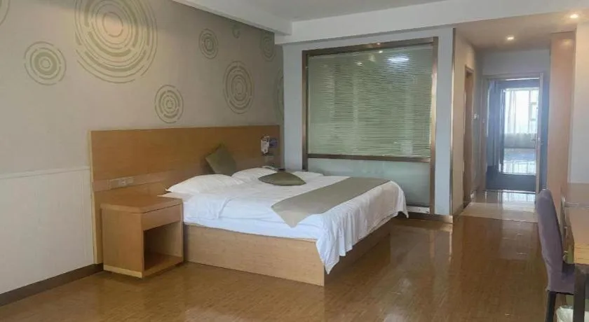 Bed in GreenTree Inn Ningbo Hangzhou Wan New District Lishi Square Business Hotel