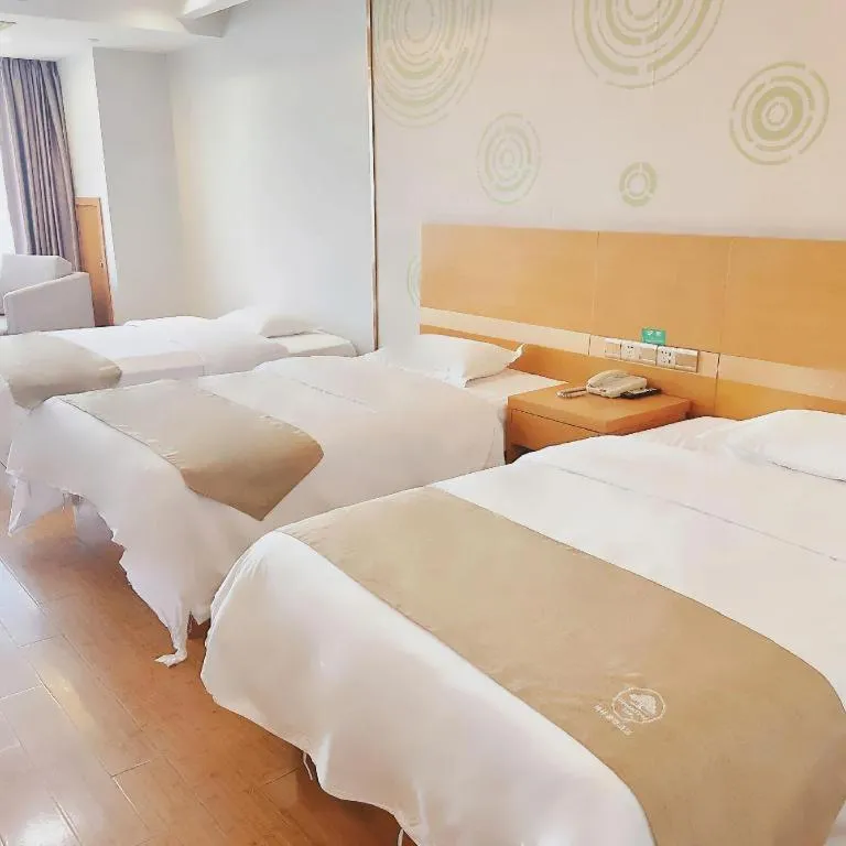 Bed in GreenTree Inn Ningbo Hangzhou Wan New District Lishi Square Business Hotel