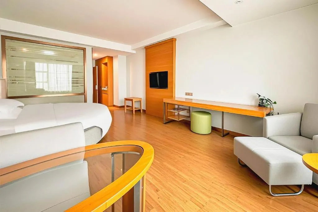 Bed in GreenTree Inn Ningbo Hangzhou Wan New District Lishi Square Business Hotel