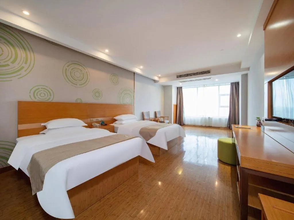 Bed in GreenTree Inn Ningbo Hangzhou Wan New District Lishi Square Business Hotel
