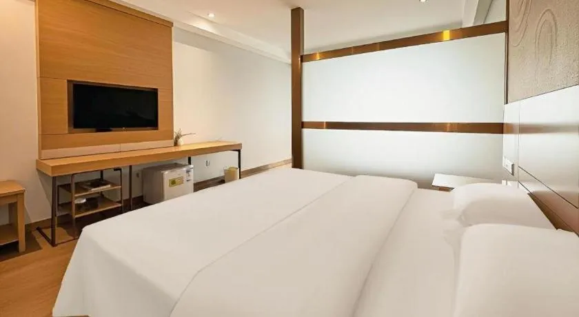 Bed in GreenTree Inn Ningbo Hangzhou Wan New District Lishi Square Business Hotel
