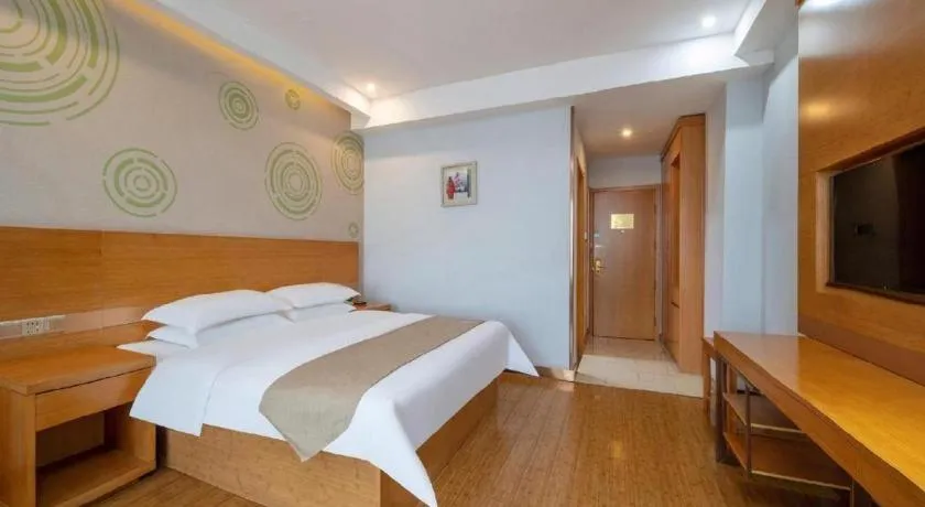 Bed in GreenTree Inn Ningbo Hangzhou Wan New District Lishi Square Business Hotel