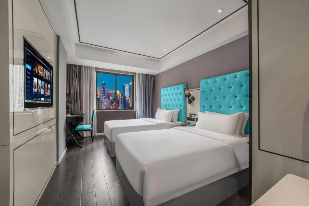 Bed in Xana Hotelle Chongqing Jiefangbei Center Branch