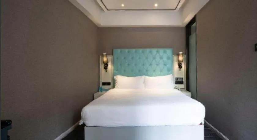 Bed in Xana Hotelle Chongqing Jiefangbei Center Branch