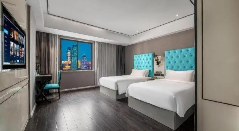 Bed in Xana Hotelle Chongqing Jiefangbei Center Branch