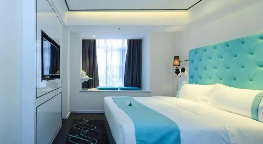 Bed in Xana Hotelle Chongqing Jiefangbei Center Branch