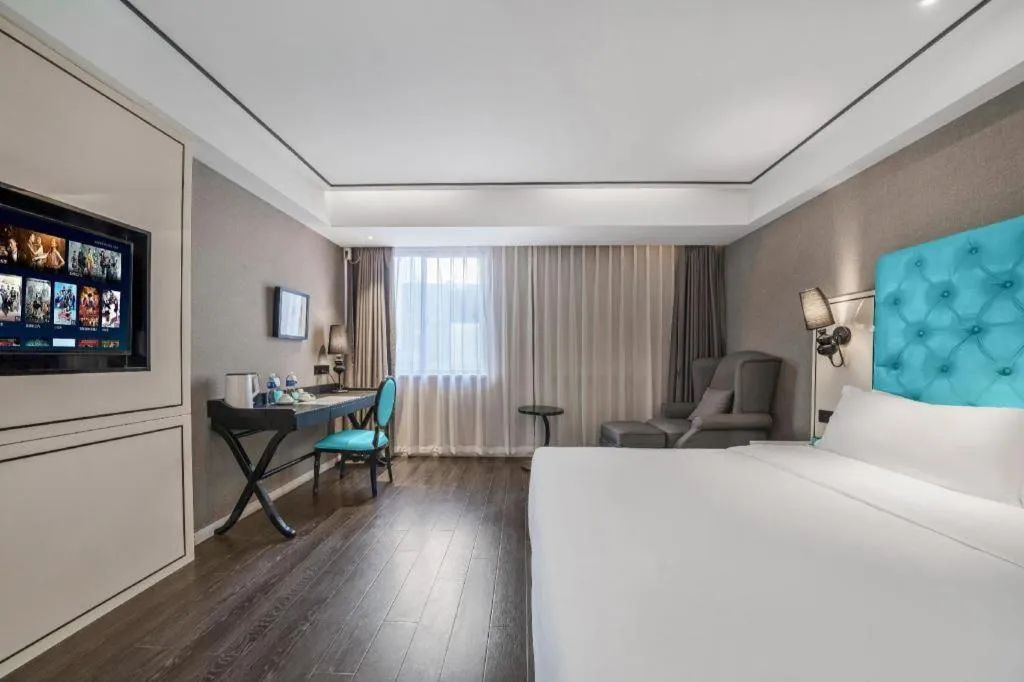 Bed in Xana Hotelle Chongqing Jiefangbei Center Branch