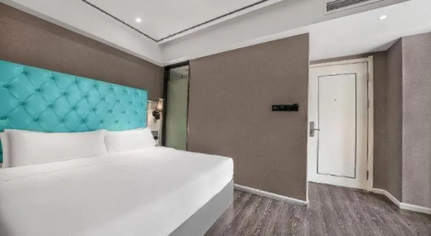 Bed in Xana Hotelle Chongqing Jiefangbei Center Branch