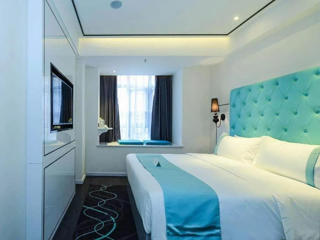 Bed in Xana Hotelle Chongqing Jiefangbei Center Branch