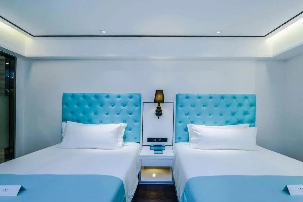 Bed in Xana Hotelle Chongqing Jiefangbei Center Branch