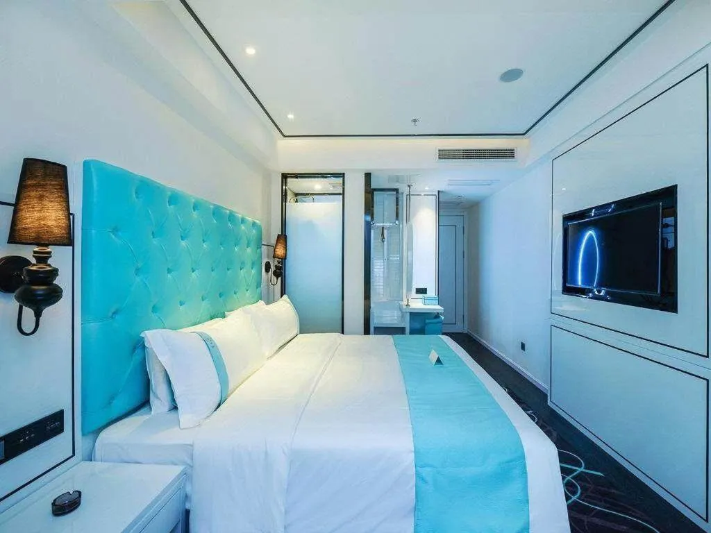 Bed in Xana Hotelle Chongqing Jiefangbei Center Branch