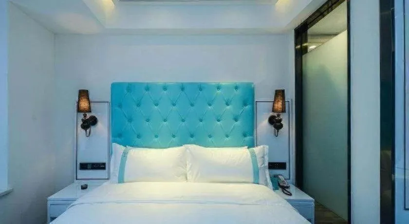 Bed in Xana Hotelle Chongqing Jiefangbei Center Branch