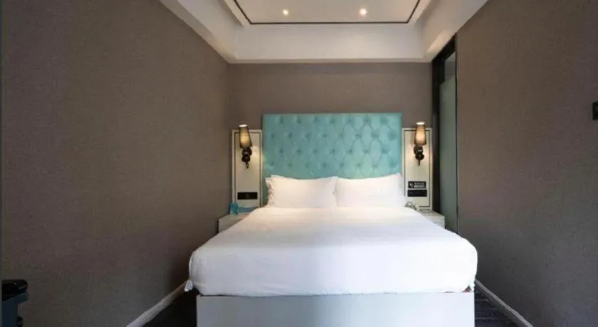 Bed in Xana Hotelle Chongqing Jiefangbei Center Branch