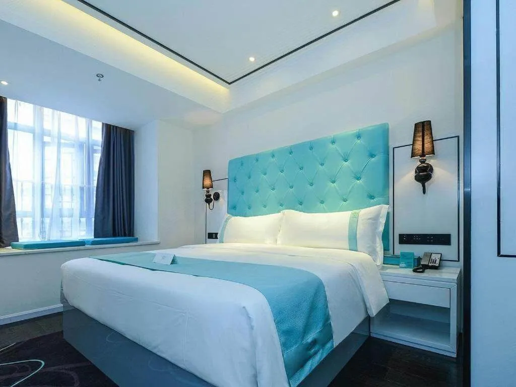 Bed in Xana Hotelle Chongqing Jiefangbei Center Branch