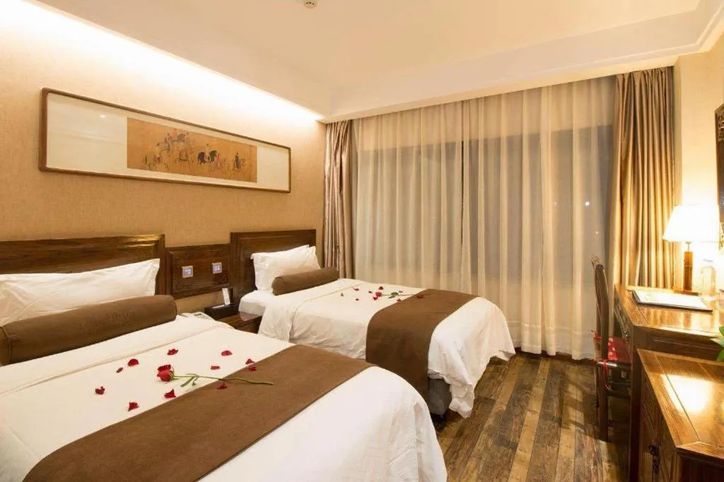 Bed in James Joyce Coffetel Xian Dayanta Metro Station Branch