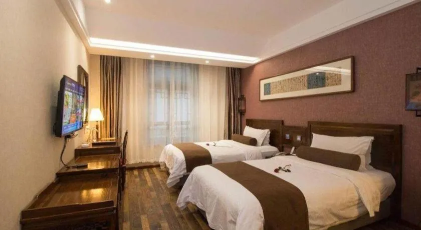 Bed in James Joyce Coffetel Xian Dayanta Metro Station Branch