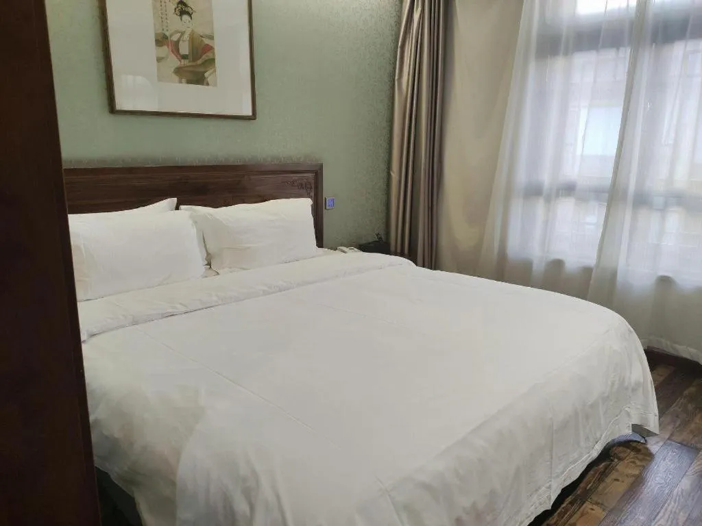 Bed in James Joyce Coffetel Xian Dayanta Metro Station Branch