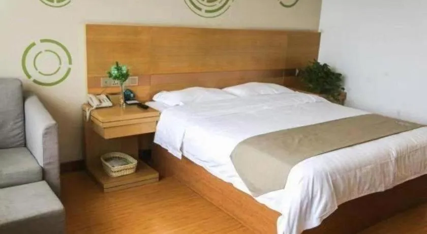 Bed in GreenTree Inn Shandong Heze Caoxian Zhuangzhai Town Oriental Times City Business Hotel