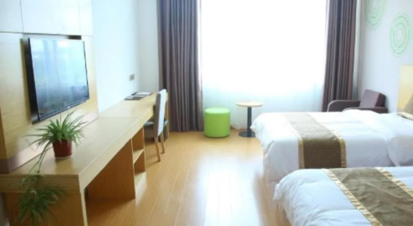 Bed in GreenTree Inn Shandong Heze Caoxian Zhuangzhai Town Oriental Times City Business Hotel