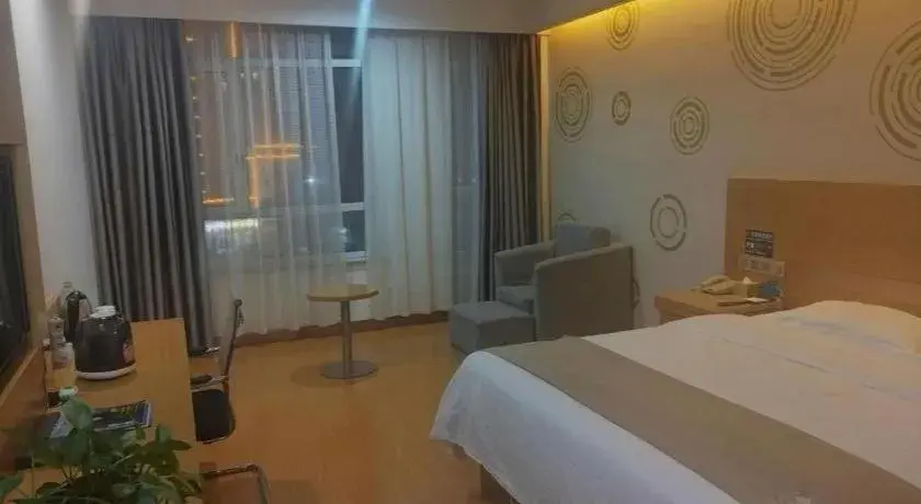 Bed in GreenTree Inn Shandong Heze Caoxian Zhuangzhai Town Oriental Times City Business Hotel Bed in GreenTree Inn Shandong Heze Caoxian Zhuangzhai Town Oriental Times City Business Hotel