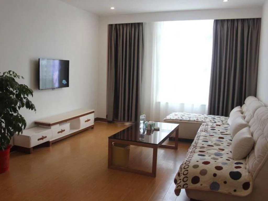 Bed in GreenTree Inn Shandong Heze Caoxian Zhuangzhai Town Oriental Times City Business Hotel