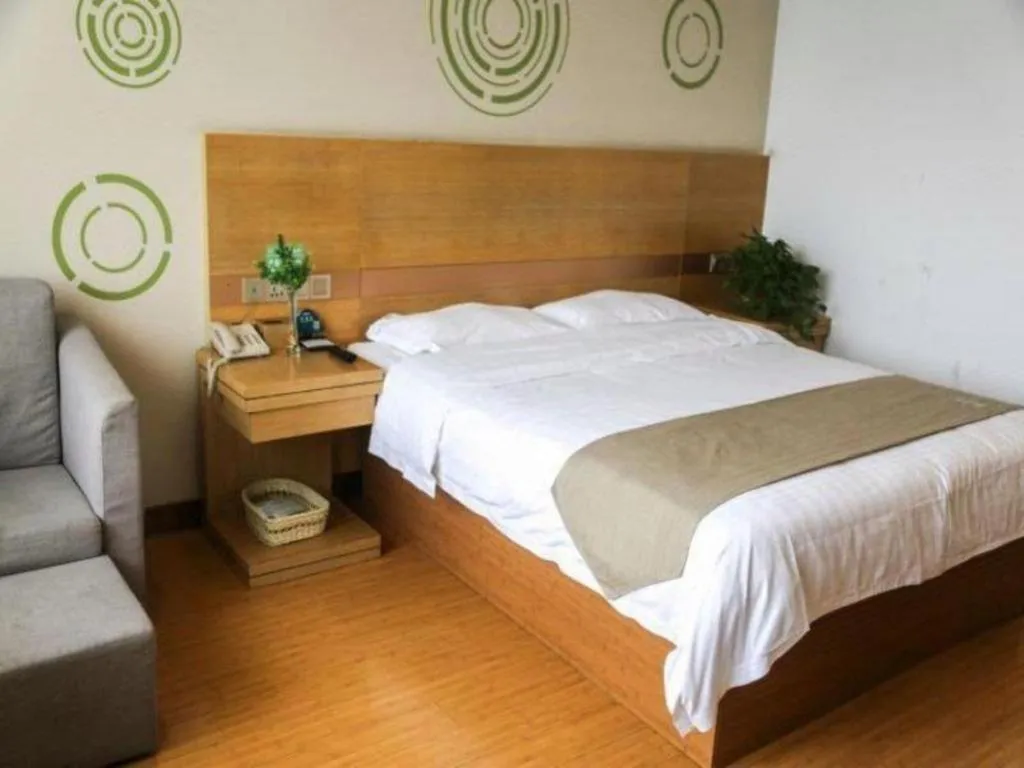 Bed in GreenTree Inn Shandong Heze Caoxian Zhuangzhai Town Oriental Times City Business Hotel