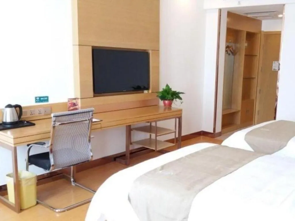 Bed in GreenTree Inn Shandong Heze Caoxian Zhuangzhai Town Oriental Times City Business Hotel