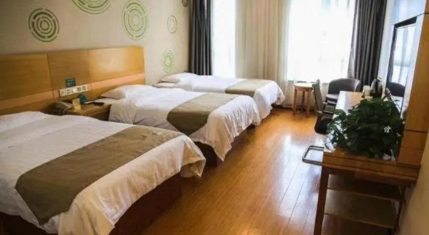 Bed in GreenTree Inn Shandong Heze Caoxian Zhuangzhai Town Oriental Times City Business Hotel
