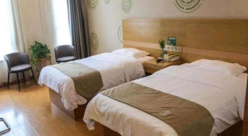 Bed in GreenTree Inn Shandong Heze Caoxian Zhuangzhai Town Oriental Times City Business Hotel