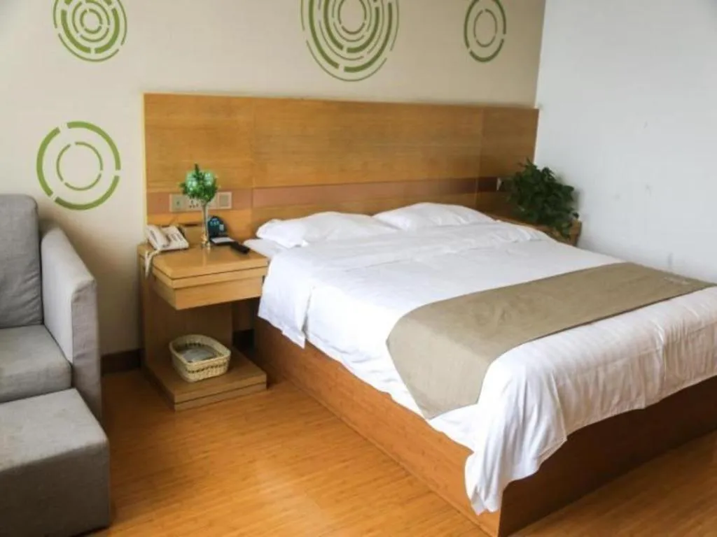 Bed in GreenTree Inn Shandong Heze Caoxian Zhuangzhai Town Oriental Times City Business Hotel
