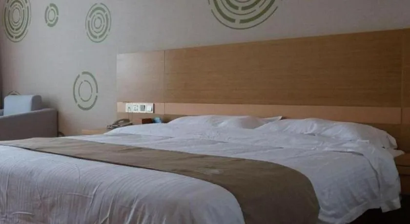 Bed in GreenTree Inn Shandong Heze Caoxian Zhuangzhai Town Oriental Times City Business Hotel