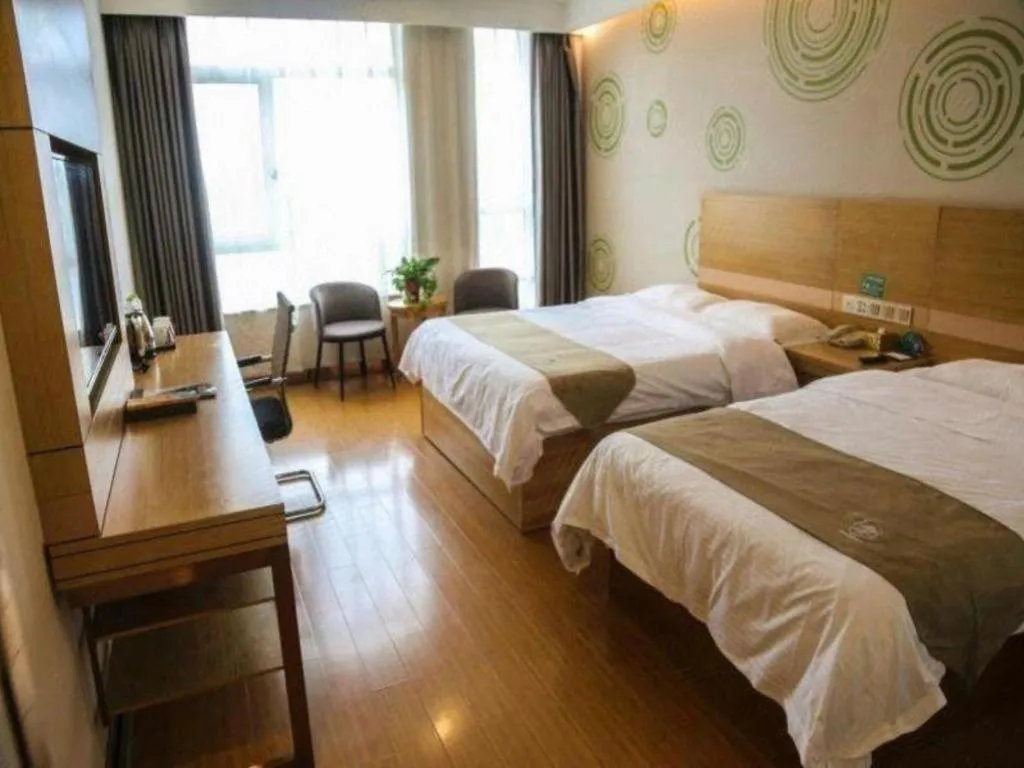 Bed in GreenTree Inn Shandong Heze Caoxian Zhuangzhai Town Oriental Times City Business Hotel
