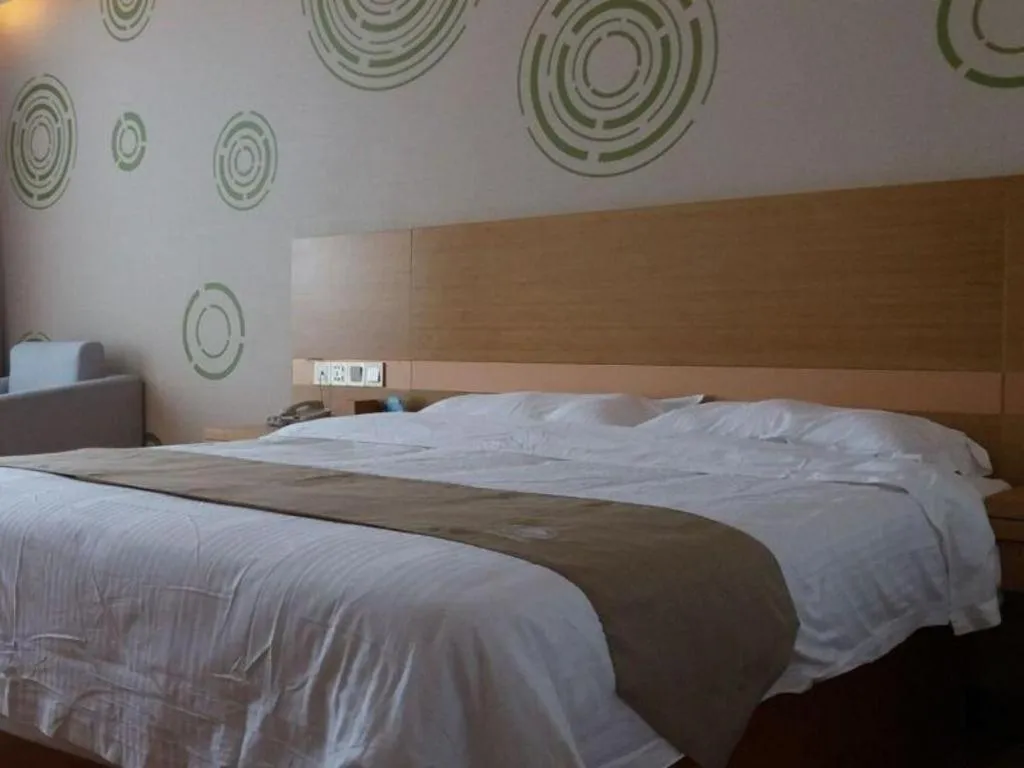 Bed in GreenTree Inn Shandong Heze Caoxian Zhuangzhai Town Oriental Times City Business Hotel
