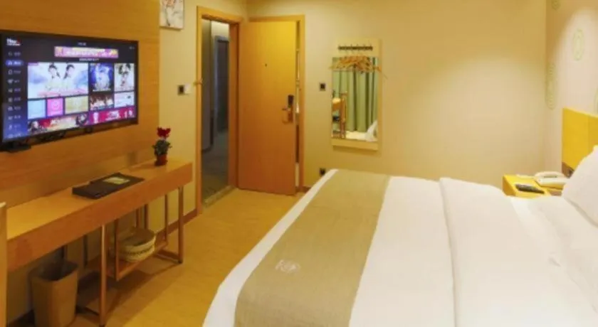 Bed in GreenTree Inn Shandong Heze Caoxian Zhuangzhai Town Oriental Times City Business Hotel