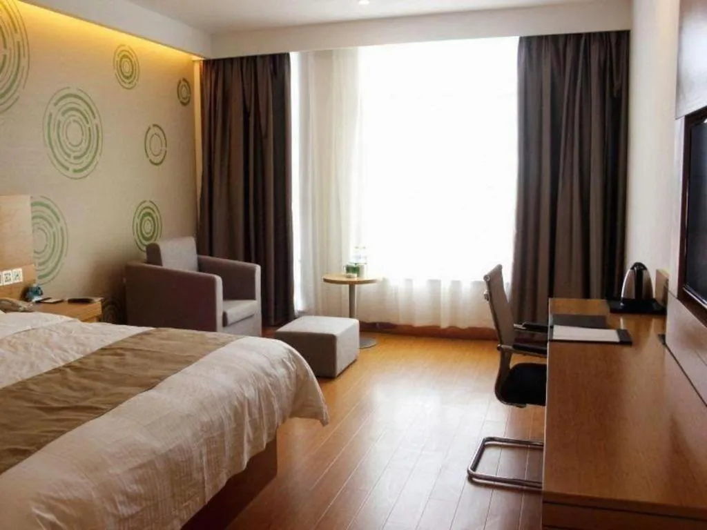 Bed in GreenTree Inn Shandong Heze Caoxian Zhuangzhai Town Oriental Times City Business Hotel