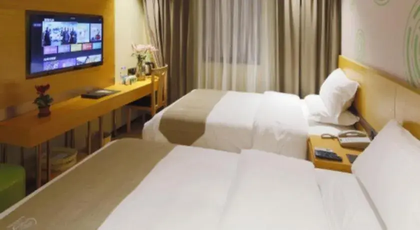 Bed in GreenTree Inn Shandong Heze Caoxian Zhuangzhai Town Oriental Times City Business Hotel Bed in GreenTree Inn Shandong Heze Caoxian Zhuangzhai Town Oriental Times City Business Hotel