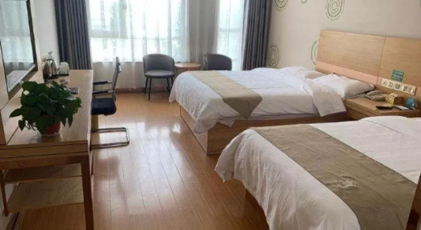 Bed in GreenTree Inn Shandong Heze Caoxian Zhuangzhai Town Oriental Times City Business Hotel
