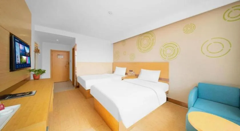 Bed in GreenTree Inn Binzhou Wudi County Yinzuo Plaza Express Hotel