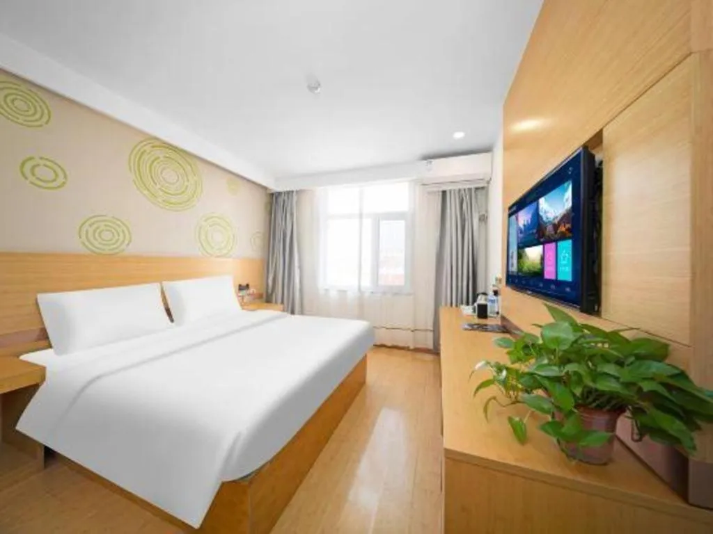 Bed in GreenTree Inn Binzhou Wudi County Yinzuo Plaza Express Hotel