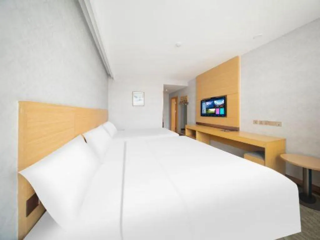 Bed in GreenTree Inn Binzhou Wudi County Yinzuo Plaza Express Hotel