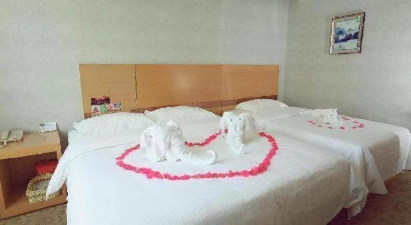 Bed in GreenTree Inn Binzhou Wudi County Yinzuo Plaza Express Hotel