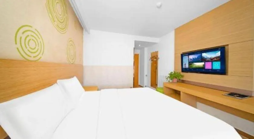 Bed in GreenTree Inn Binzhou Wudi County Yinzuo Plaza Express Hotel