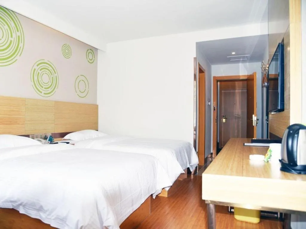 Bed in GreenTree Inn Binzhou Wudi County Yinzuo Plaza Express Hotel