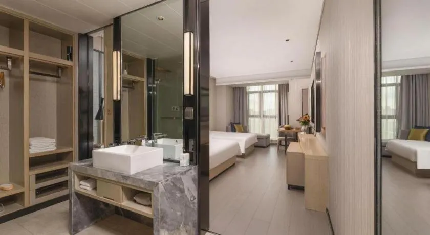 Bed in Echarm Hotel Wuxi Zhongnan Road Ancient Canal