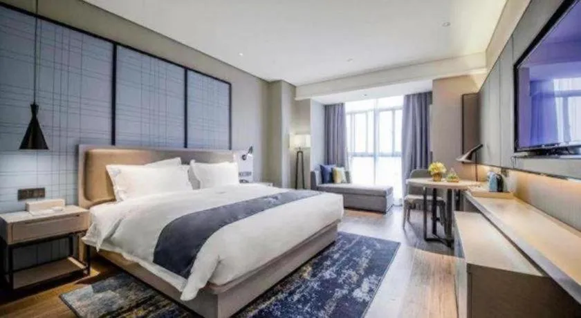 Bed in Echarm Hotel Wuxi Zhongnan Road Ancient Canal
