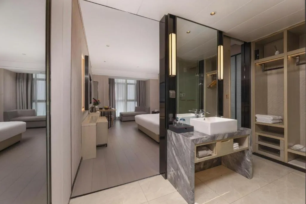 Bed in Echarm Hotel Wuxi Zhongnan Road Ancient Canal